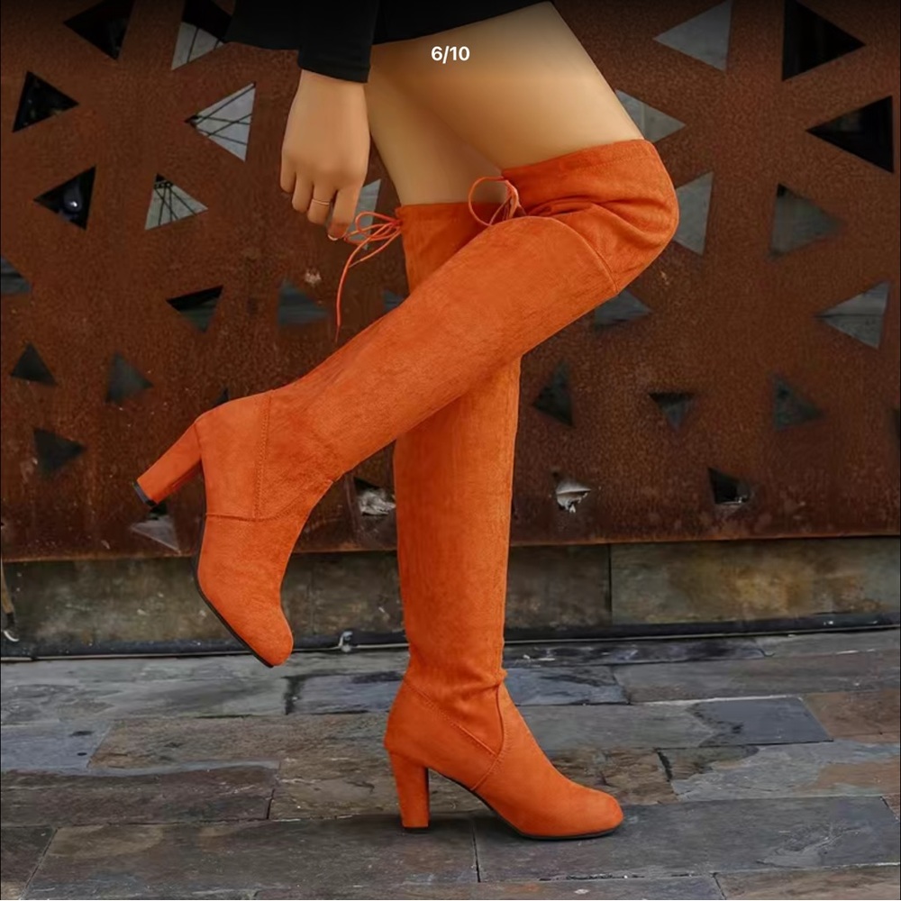 Over the knee boots. Orange and can bee folded down also. Chunky Heals